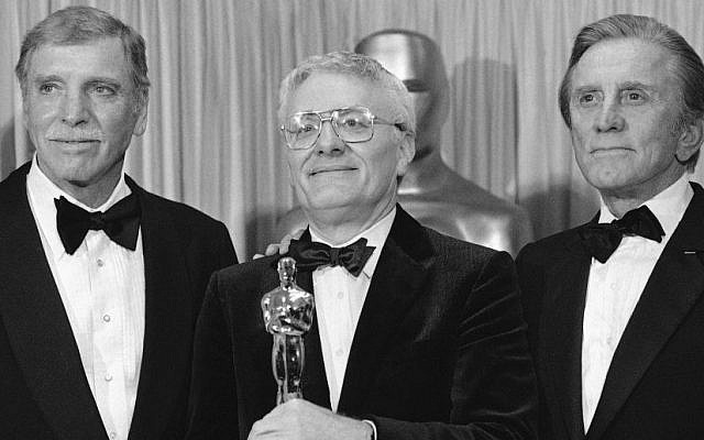 Actors Burt Lancaster, left, and Kirk Douglas, right, stand with Peter Shaffer, winner of the best adapted screenplay Oscar for "Amadeus", during the Academy Awards in Los Angeles, Ca., USA, March 25, 1985. (AP Photo, FILE) Actors Burt Lancaster, left, and Kirk Douglas, right, stand with Peter Shaffer, winner of the best adapted screenplay Oscar for "Amadeus", during the Academy Awards in Los Angeles, Ca., USA, March 25, 1985. (AP Photo, FILE)