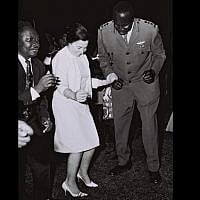 Miriam Eshkol, wife of Prime Minister Levi Eshkol, dancing with then Ugandan foreign minister Sam Odaka and army chief (and later president) Idi Amin on a visit to an army base outside Kampala, June, 1966. (GPO)
