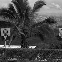 Images of Prime Minister Shimon Peres and Cameroonian President Paul Biya decorate the road to Yaoundé, Cameroon's capital city, August 25, 1986. (Nati Harnik/GPO)