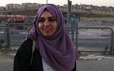 Samah Annan, a clothing store owner in Ramallah. (Luke Tress / Times of Israel) 