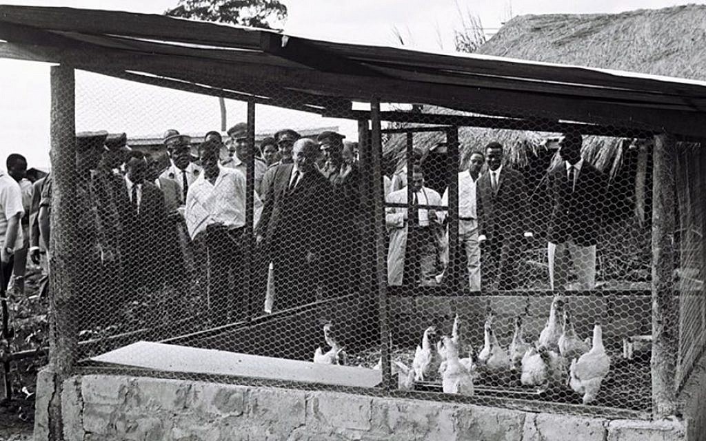 Prime Minister Levi Eshkol tours a newly established village, similar to a moshav, in Ivory Coast, June 1, 1966. (Moshe Fridan/GPO)