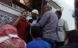 Abd Al-Aziz Al-Saifi, a self-proclaimed child preacher, rants against Israel in a Jordanian mosque as several men attempt to persuade him to be silent (YouTube screenshot)