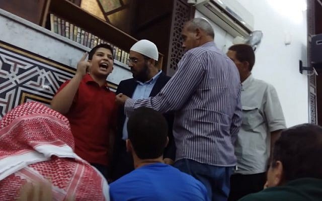 Abd Al-Aziz Al-Saifi, a self-proclaimed child preacher, rants against Israel in a Jordanian mosque as several men attempt to persuade him to be silent (YouTube screenshot) Abd Al-Aziz Al-Saifi, a self-proclaimed child preacher, rants against Israel in a Jordanian mosque as several men attempt to persuade him to be silent (YouTube screenshot)