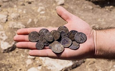 Cache of silver coins found at an estate house in Modiin, June 7, 2016. (Assaf Peretz, courtesy of the Israel Antiquities Authority)