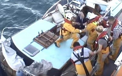 Members of the Royal National Lifeboat Institution at Dover in action (screen capture: YouTube)