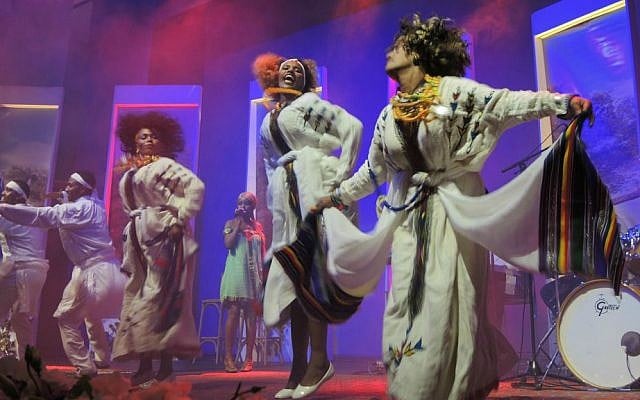 Members of the Insara Performance Group dancing a traditional Ethiopian dance at the celebratory launch of the National Institute for Ethiopian Jewry Heritage Center on June 19, 2016 in Jerusalem. (Melanie Lidman/Times of Israel) Members of the Insara Performance Group dancing a traditional Ethiopian dance at the celebratory launch of the National Institute for Ethiopian Jewry Heritage Center on June 19, 2016 in Jerusalem. (Melanie Lidman/Times of Israel)