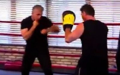 A screenshot from a 2015 video in which Yair Lapid spars. (Screenshot/YouTube)