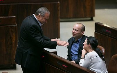 Yisrael Beytenu leader Avigdor Liberman, left, seen with then-Jewish Home head Naftali Bennett, center, and MK Ayelet Shaked in the Knesset plenum, May 11, 2015. (Miriam Alster/Flash90)