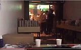Customers at Istanbul record store attending a Radiohead album release party on June 17, 2016 attacked by Islamist mob for attending event during Muslim holiday of Ramadan. (screen capture: YouTube)