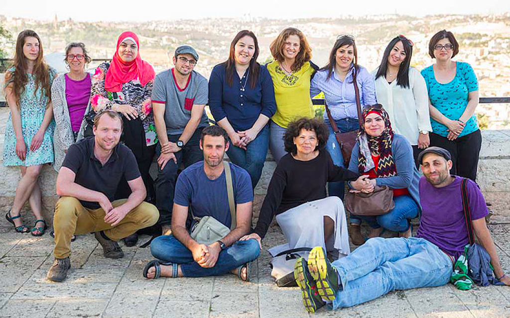 The 15 teachers who participated in the 2016 Teachers' Room coexistence project, which includes photographs now on exhibit at the Jerusalem YMCA (Courtesy Dana Talel) The 15 teachers who participated in the 2016 Teachers' Room coexistence project, which includes photographs now on exhibit at the Jerusalem YMCA (Courtesy Dana Talel)