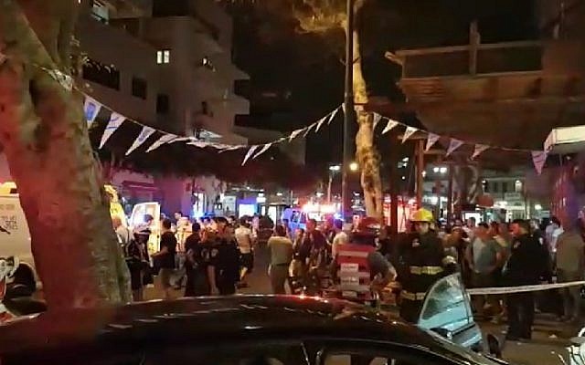 First responders at the scene of a car accident in Tel Aviv on June 18, 2016. (Screengrab/MDA)