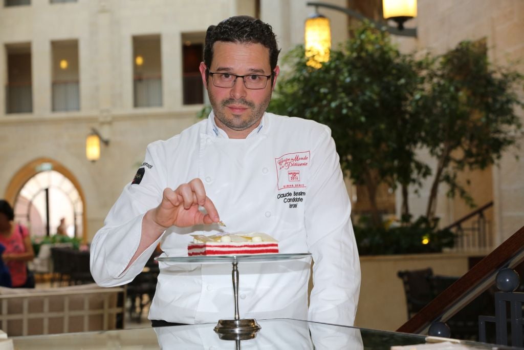 Waldorf Astoria pastry chef Claude Ben Simon shows off his Red Velvet cheesecake (Courtesy Waldorf Astoria) Waldorf Astoria pastry chef Claude Ben Simon shows off his Red Velvet cheesecake (Courtesy Waldorf Astoria)