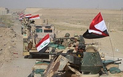 Iraqi government forces are seen near the Falahat village west of Fallujah on June 27, 2016. (AFP/Moadh al-Dulaimi)