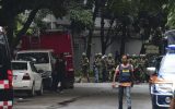 Bangladeshi army soldiers patrol a street during a rescue operation as gunmen take position in a restaurant in the Dhakas high-security diplomatic district on July 2, 2016. (AFP PHOTO/APF/STR)