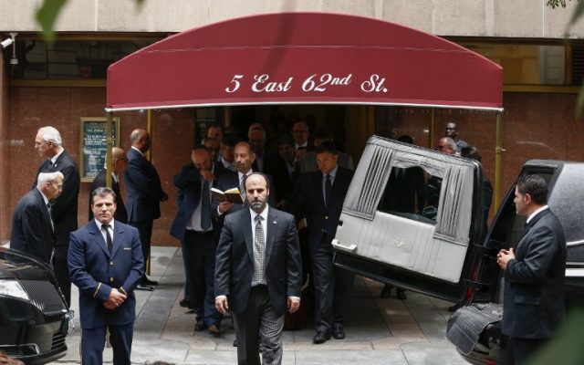 People exit the Fifth Avenue Synagogue during the funeral for Nobel laureate and Holocaust survivor Elie Wiesel on July 3, 2016 in New York. (AFP PHOTO / KENA BETANCUR)