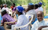 The Abayudaya Jewish community's members sit as they listen to their spiritual leader, in a village near Mbale, eastern Uganda, July 2, 2016. (AFP/Michael O'Hagan)