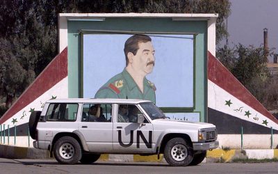 This file photo taken on February 2, 2003 shows a UN disarmament experts vehicle passing by a portrait of Iraqi President Saddam Hussein as they arrive at a milk factory in Abu Gharib, 15 kms west of Baghdad (AFP PHOTO / AHMAD AL-RUBAYE) This file photo taken on February 2, 2003 shows a UN disarmament experts vehicle passing by a portrait of Iraqi President Saddam Hussein as they arrive at a milk factory in Abu Gharib, 15 kms west of Baghdad (AFP PHOTO / AHMAD AL-RUBAYE)