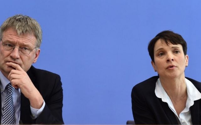 The head of right-wing populist Alternative for Germany (AfD) Frauke Petry (R) and then AfD main-candidates in Baden-Wuerttemberg Joerg Meuthen during a press conference in Berlin. March 14, 2016 (AFP Photo/John MacDougall) The head of right-wing populist Alternative for Germany (AfD) Frauke Petry (R) and then AfD main-candidates in Baden-Wuerttemberg Joerg Meuthen during a press conference in Berlin. March 14, 2016 (AFP Photo/John MacDougall)