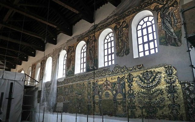 A picture taken on July 8, 2016 shows a general view of ancient mosaics on a wall in the upper part of the Church of the Nativity, which were uncovered during restoration works by Italian experts at the site, in the biblical West Bank town of Bethlehem. (Thomas Coex/AFP)