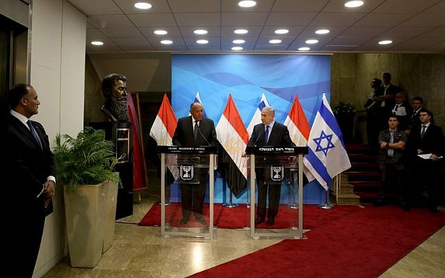 Prime Minister Benjamin Netanyahu, right, gives a joint statement with Egyptian Foreign Minister Sameh Shoukry prior to their meeting at his Jerusalem office on July 10, 2016 (AFP Photo/Gali Tibbon) Prime Minister Benjamin Netanyahu, right, gives a joint statement with Egyptian Foreign Minister Sameh Shoukry prior to their meeting at his Jerusalem office on July 10, 2016 (AFP Photo/Gali Tibbon)
