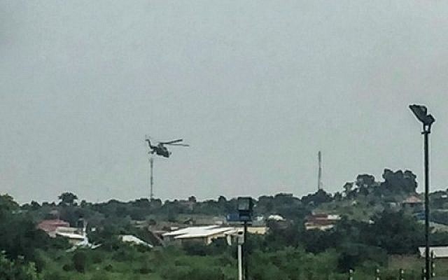 South Sudanese government attack helicopters hover over the Checkpoint district of the capital Juba, near the Jebel district which has seen some of the heaviest fighting, on July 11, 2016. (AFP PHOTO / STR) South Sudanese government attack helicopters hover over the Checkpoint district of the capital Juba, near the Jebel district which has seen some of the heaviest fighting, on July 11, 2016. (AFP PHOTO / STR)