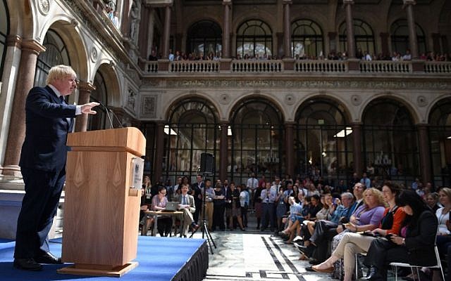 Newly appointed Foreign Secretary Boris Johnson addresses staff inside the Foreign and Commonwealth Office in central London on July 14, 2016, as cabinet appointments by new prime minister Theresa May are made on her first full day in office. (AFP/ POOL/Andrew Matthews)
