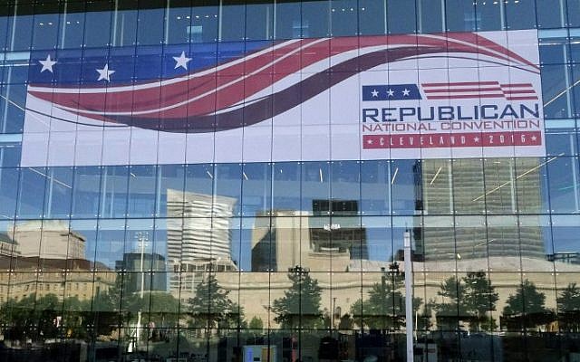 The skyline of downtown Cleveland, Ohio is reflected on the windows of the Convention Center July 14 2016, days before the city hosts the Republican National Convention. (AFP PHOTO / Eva HAMBACH)