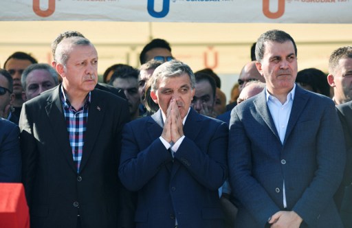 Turkey's President Recep Tayyip Erdogan (L) and former Turkish president Abdullah Gul (C) react after attending the funeral of a victim of the coup attempt in Istanbul on July 17, 2016. (Fethullah Gulen / AFP PHOTO / BULENT KILIC) Turkey's President Recep Tayyip Erdogan (L) and former Turkish president Abdullah Gul (C) react after attending the funeral of a victim of the coup attempt in Istanbul on July 17, 2016. (Fethullah Gulen / AFP PHOTO / BULENT KILIC)