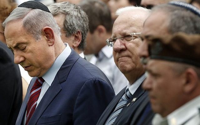 From left: Prime Minister Benjamin Netanyahu, President Reuven Rivlin, Defense Minister Avigdor Lieberman and IDF Chief of Staff Lt. Gen. Gadi Eizenkot attend an official memorial ceremony marking the tenth anniversary of the 2006 war between Israel and Lebanon's Hezbollah at the military cemetery on Mount Herzl in Jerusalem, July 19, 2016. (AFP Photo/Thomas Coex) From left: Prime Minister Benjamin Netanyahu, President Reuven Rivlin, Defense Minister Avigdor Lieberman and IDF Chief of Staff Lt. Gen. Gadi Eizenkot attend an official memorial ceremony marking the tenth anniversary of the 2006 war between Israel and Lebanon's Hezbollah at the military cemetery on Mount Herzl in Jerusalem, July 19, 2016. (AFP Photo/Thomas Coex)