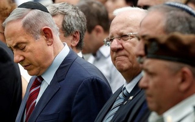 From left: Prime Minister Benjamin Netanyahu, President Reuven Rivlin, Defense Minister Avigdor Lieberman, and IDF Chief of Staff Lt. Gen. Gadi Eizenkot attend an official memorial ceremony marking the tenth anniversary of the 2006 war between Israel and Lebanon's Hezbollah at the military cemetery on Mount Herzl in Jerusalem, July 19, 2016. (AFP Photo/Thomas Coex/File) From left: Prime Minister Benjamin Netanyahu, President Reuven Rivlin, Defense Minister Avigdor Lieberman, and IDF Chief of Staff Lt. Gen. Gadi Eizenkot attend an official memorial ceremony marking the tenth anniversary of the 2006 war between Israel and Lebanon's Hezbollah at the military cemetery on Mount Herzl in Jerusalem, July 19, 2016. (AFP Photo/Thomas Coex/File)