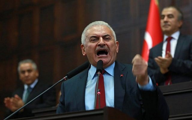Turkish Prime Minister and the leader of Turkey's ruling party, the Justice and Development Party (AK Party) Binali Yildirim speaks during the AK Party's group meeting at the Grand National Assembly of Turkey (TBMM) in Ankara, on July 19, 2016. (AFP PHOTO / ADEM ALTAN)