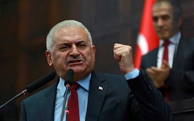 Turkish Prime Minister and the leader of Turkey's ruling party, the Justice and Development Party (AK Party) Binali Yildirim speaks during the AK Party's group meeting at the Grand National Assembly of Turkey (TBMM) in Ankara, July 19, 2016.  (AFP/ADEM ALTAN)