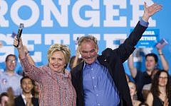 US Democratic presidential candidate Hillary Clinton and US Senator Tim Kaine of Virginia seen at a campaign rally in Annandale, Virginia, on July 14, 2016. (AFP/Saul Loeb)