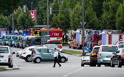Police and firefighters are seen near a shopping mall amid a shooting on July 22, 2016 in Munich, Germany. (AFP Photo/dpa/Matthias Balk) Police and firefighters are seen near a shopping mall amid a shooting on July 22, 2016 in Munich, Germany. (AFP Photo/dpa/Matthias Balk)