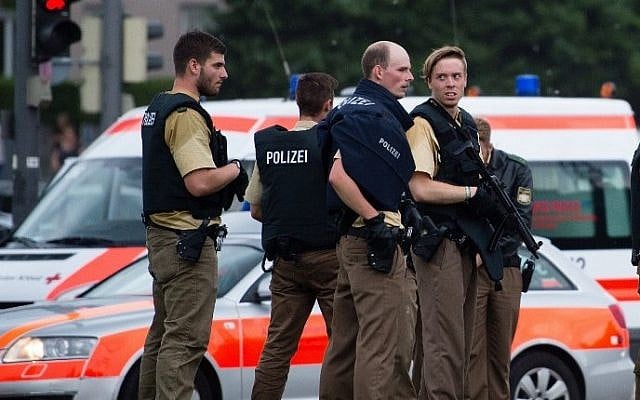 Police secures the area near a shopping mall following a shooting on July 22, 2016 in Munich. Several people were killed on Friday in a shooting rampage by a lone gunman in a Munich shopping center, media reports said. (Matthias Balk/DPA/AFP)