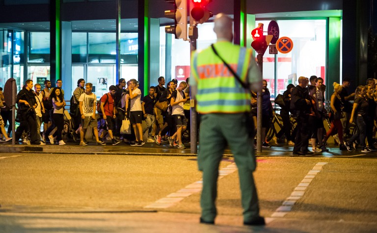 People are evacuated from the area around the shopping mall Olympia Einkaufzentrum OEZ in Munich, Germany on July 22, 2016 after gunmen went on a shooting rampage in the busy shopping center, killing nine people before taking his own life. (AFP PHOTO/STRINGER) People are evacuated from the area around the shopping mall Olympia Einkaufzentrum OEZ in Munich, Germany on July 22, 2016 after gunmen went on a shooting rampage in the busy shopping center, killing nine people before taking his own life. (AFP PHOTO/STRINGER)