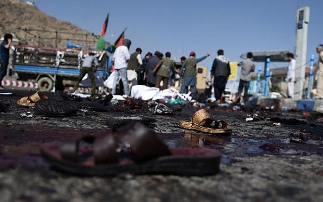 The sandals of Afghan protesters seen at the scene of a suicide attack that targeted crowds of minority Shiite Hazaras during a demonstration at the Deh Mazang Circle in Kabul on July 23, 2016. (AFP / WAKIL KOHSAR)