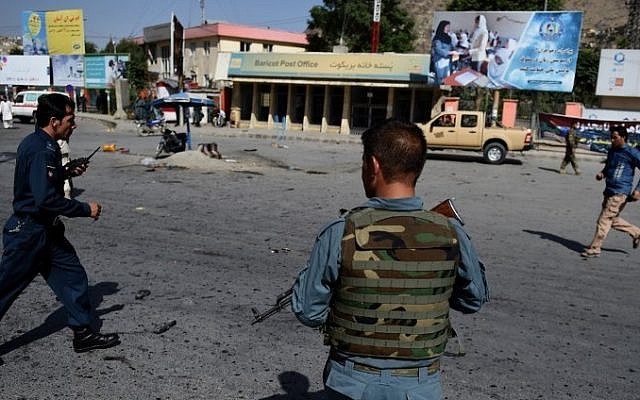 Afghan security personnel arrive after a suicide attack that targeted crowds of minority Shiite Hazaras during a demonstration at the Deh Mazang Circle of Kabul on July 23, 2016. (AFP/ WAKIL KOHSAR) Afghan security personnel arrive after a suicide attack that targeted crowds of minority Shiite Hazaras during a demonstration at the Deh Mazang Circle of Kabul on July 23, 2016. (AFP/ WAKIL KOHSAR)