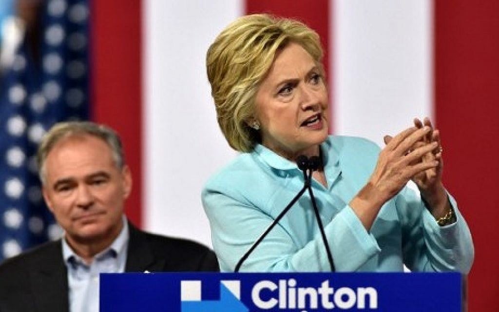 US Democratic presidential candidate Hillary Clinton introduces her running mate US Senator Tim Kaine at a campaign rally at Florida International University in Miami, July 23, 2016. (AFP Photo/Gaston De Cardenas)