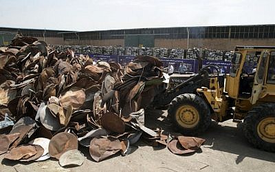 Satellite dishes and receivers before being destroyed during a ceremony in the Iranian capital Tehran, July 24, 2016. (AFP PHOTO / TASNIM NEWS / HOSSEIN ZOHREVAND)