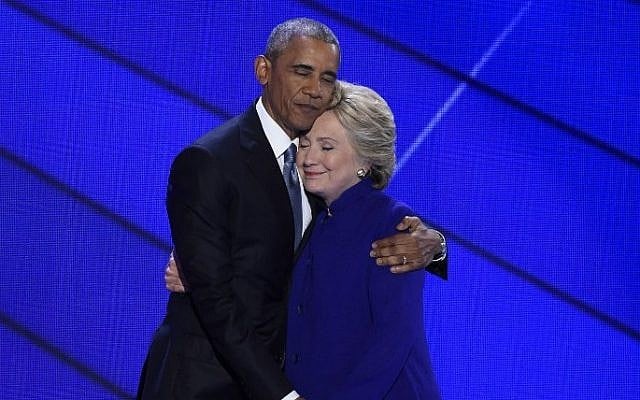 US President Barack Obama and Democratic presidential nominee Hillary Clinton embrace on stage during Day 3 of the Democratic National Convention at the Wells Fargo Center, July 27, 2016 in Philadelphia, Pennsylvania. (AFP PHOTO / SAUL LOEB) US President Barack Obama and Democratic presidential nominee Hillary Clinton embrace on stage during Day 3 of the Democratic National Convention at the Wells Fargo Center, July 27, 2016 in Philadelphia, Pennsylvania. (AFP PHOTO / SAUL LOEB)