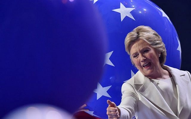 Presidential nominee Hillary Clinton gives a thumbs-up at the end of the fourth and final night of the Democratic National Convention at Wells Fargo Center in Philadelphia on July 28, 2016. (AFP PHOTO/Nicholas Kamm)