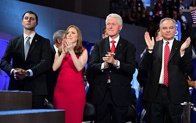 Former US president Bill Clintonstands with daughter Chelsea Clinton , son-in-law Marc Mezvinsky (L), and Democratic vice presidential candidate Tim Kaine as Democratic presidential nominee Hillary Clinton addresses delegates on the fourth and final night of the Democratic National Convention at Wells Fargo Center in Philadelphia on July 28, 2016. (AFP PHOTO/Robyn Beck)