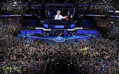 Democratic presidential nominee Hillary Clinton gives a thumbs-up after accepting the nomination during the fourth and final night of the Democratic National Convention at the Wells Fargo Center in Philadelphia on July 28, 2016. (AFP PHOTO/SAUL LOEB)