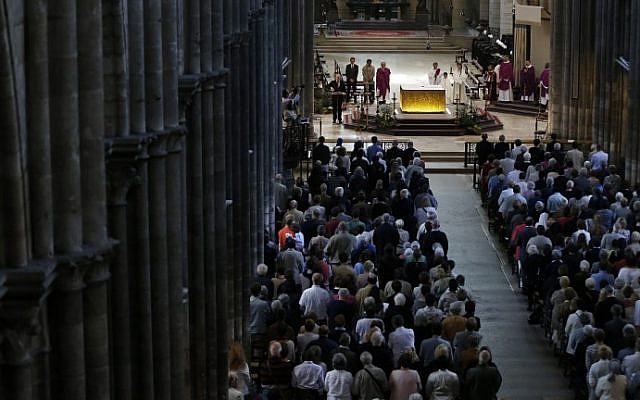 People attend a Mass in tribute to priest Jacques Hamel on July 31, 2016, in in the Rouen Cathedral in northern France. (AFP PHOTO / CHARLY TRIBALLEAU) People attend a Mass in tribute to priest Jacques Hamel on July 31, 2016, in in the Rouen Cathedral in northern France. (AFP PHOTO / CHARLY TRIBALLEAU)