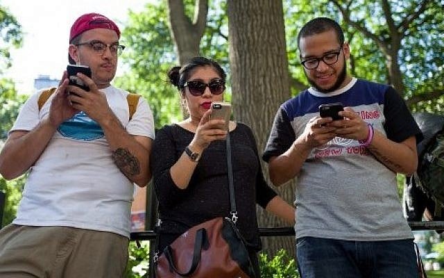 A group of friends play Pokemon Go on their smartphones at Union Square, July 11, 2016 in New York City. (Drew Angerer/Getty Images/AFP) A group of friends play Pokemon Go on their smartphones at Union Square, July 11, 2016 in New York City. (Drew Angerer/Getty Images/AFP)