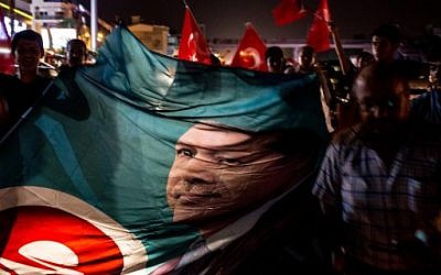 People take to the street in support of President Recep Tayyip Erdogan July 16, 2016 in Antalya, Turkey. Reports have suggested that a group within Turkey's military have attempted to overthrow the government. (Chris McGrath/Getty Images/AFP)