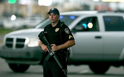 An East Baton Rouge Police officer patrols Airline Hwy after 3 police officers were killed early this morning on July 17, 2016 in Baton Rouge, Louisiana. (Sean Gardner/Getty Images/AFP)