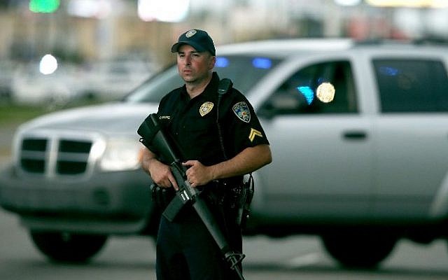 An East Baton Rouge Police officer patrols Airline Hwy after 3 police officers were killed early this morning on July 17, 2016 in Baton Rouge, Louisiana. (Sean Gardner/Getty Images/AFP) An East Baton Rouge Police officer patrols Airline Hwy after 3 police officers were killed early this morning on July 17, 2016 in Baton Rouge, Louisiana. (Sean Gardner/Getty Images/AFP)