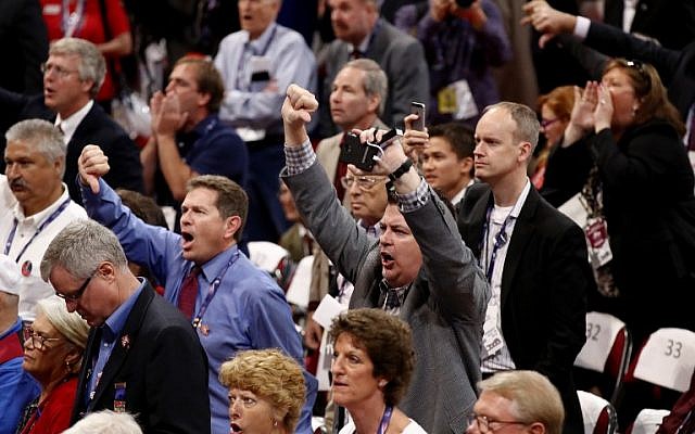 Delegates protest on the floor on the first day of the Republican National Convention on July 18, 2016 at the Quicken Loans Arena in Cleveland, Ohio. (Win McNamee/Getty Images/AFP) Delegates protest on the floor on the first day of the Republican National Convention on July 18, 2016 at the Quicken Loans Arena in Cleveland, Ohio. (Win McNamee/Getty Images/AFP)